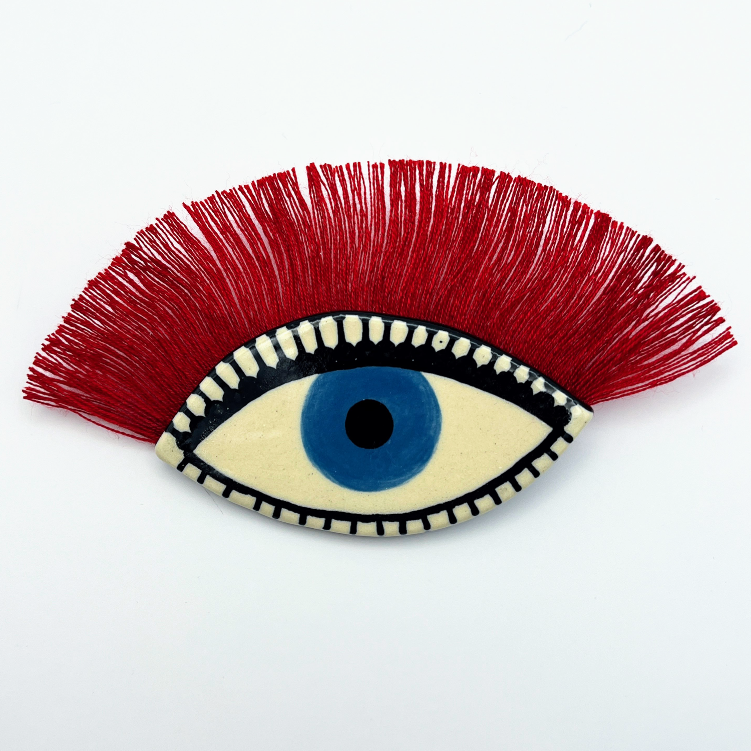Here and Here: Blue Eye Brooch with Red Lashes Product Image 1 of 2