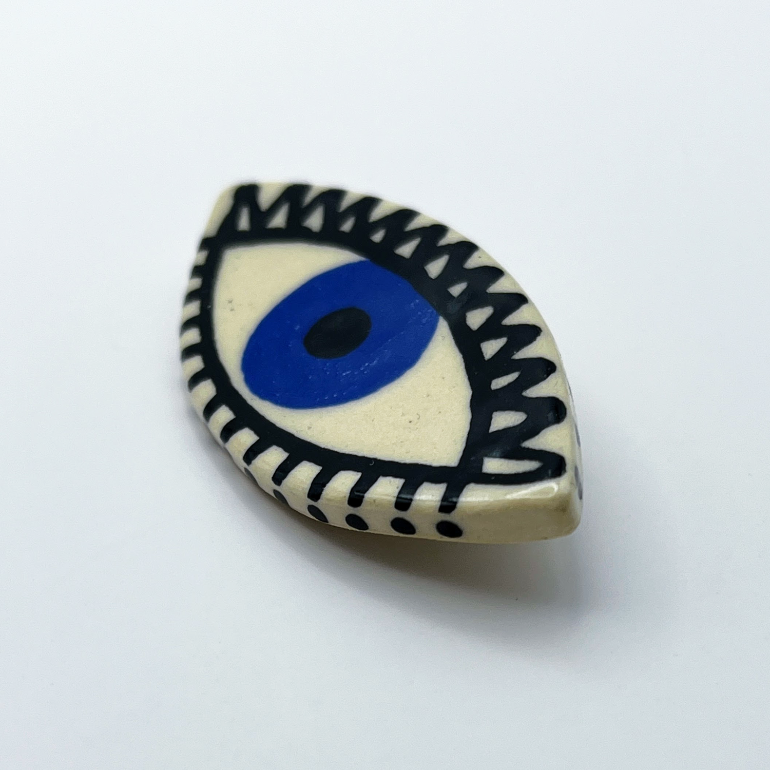 Here and Here: Blue Eye Brooch with Zigzag Lashes Product Image 2 of 2