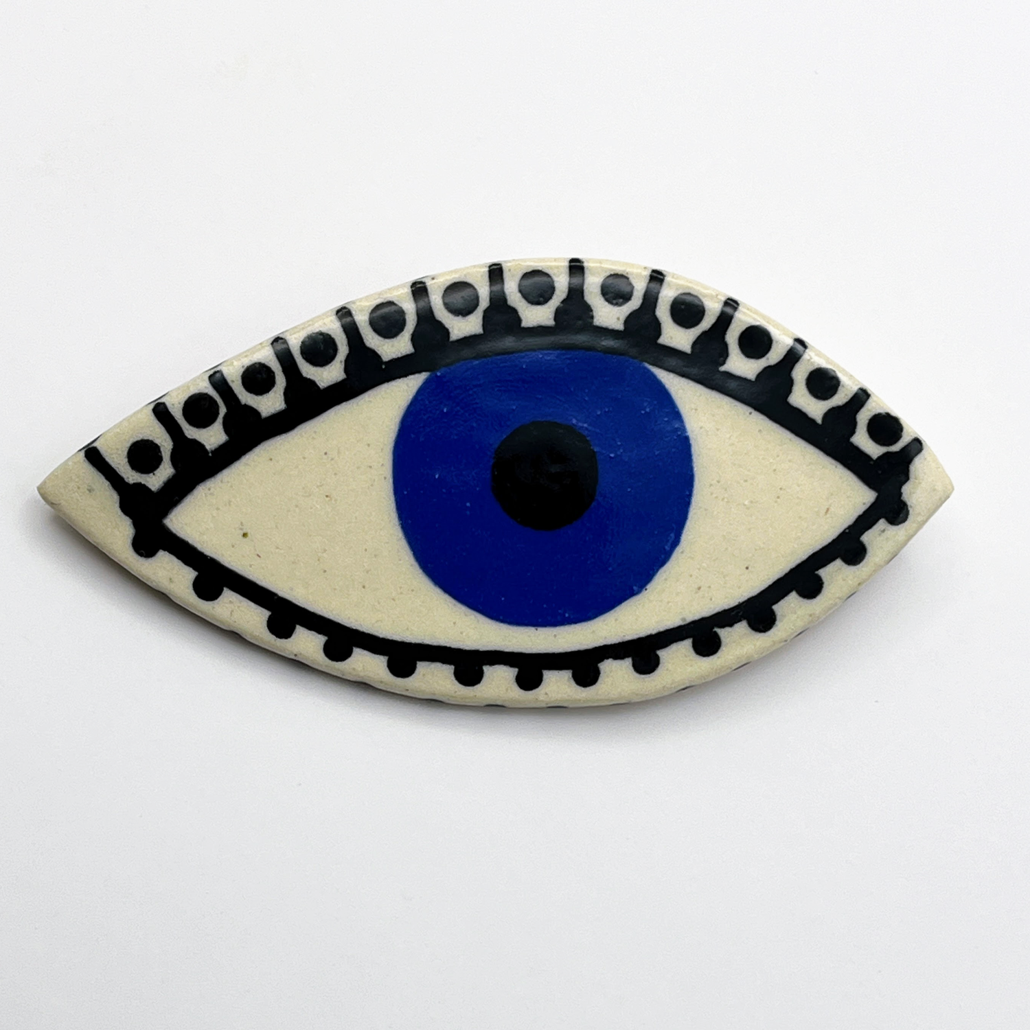 Here and Here: Blue Eye Brooch with Dotted Lashes Product Image 1 of 2