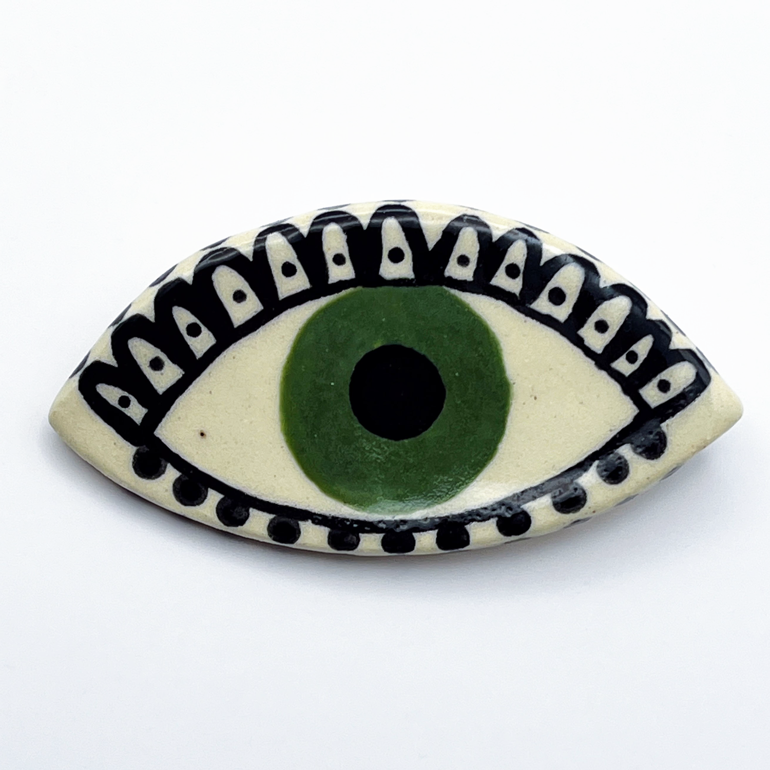Here and Here: Green Eye Brooch with Scallop and Dot Lashes Product Image 1 of 2