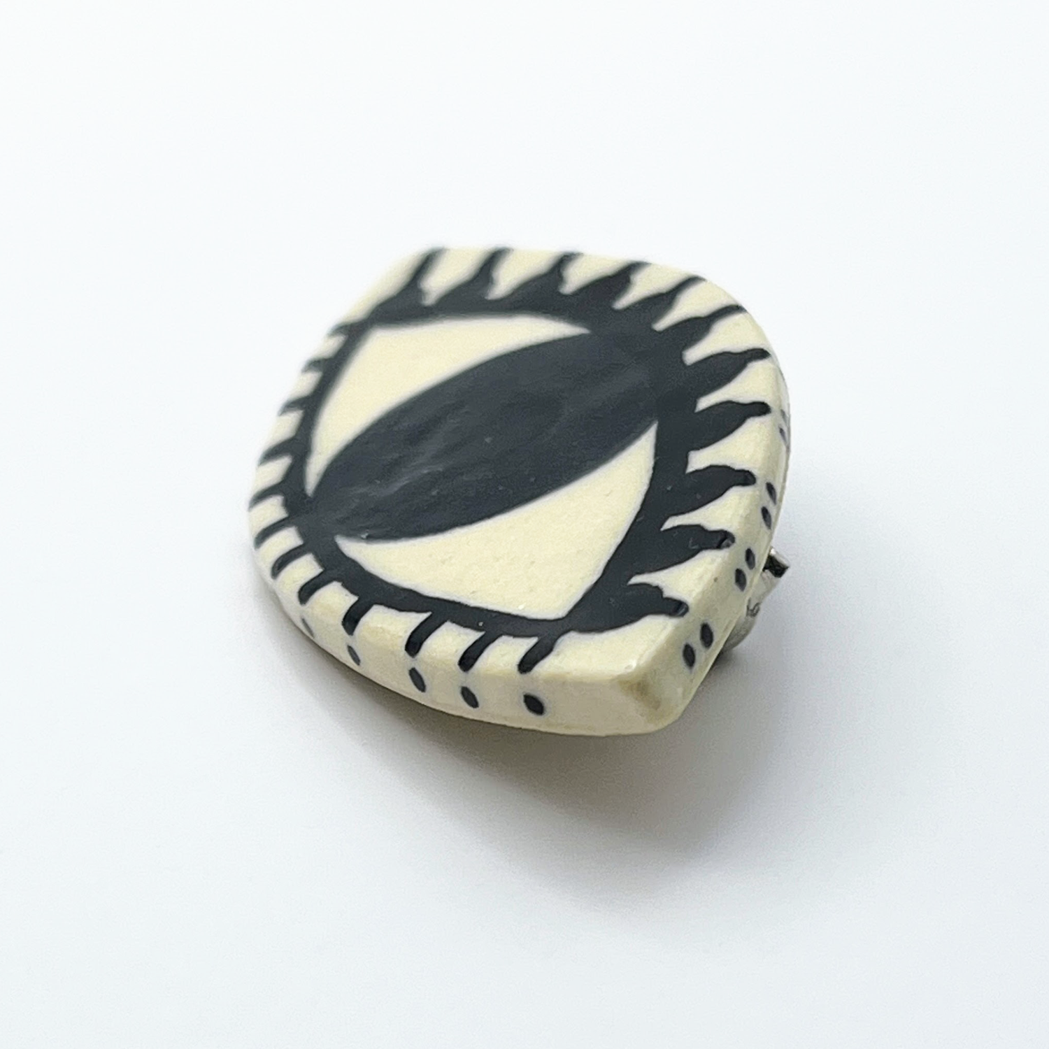 Here and Here: Green and Black Eye Brooch with Dotted Lashes Product Image 2 of 2