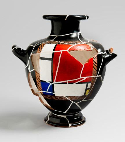 Black ceramic vessels with white, red, and blue shards