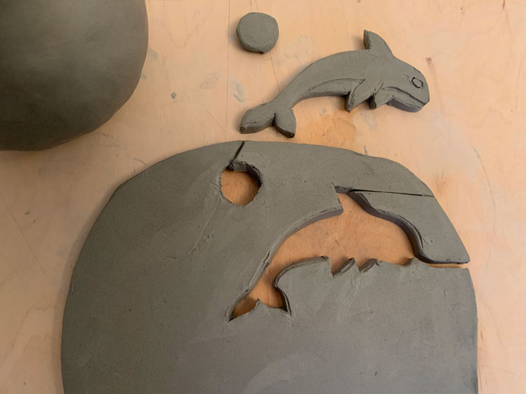 Cut-out of a clay whale