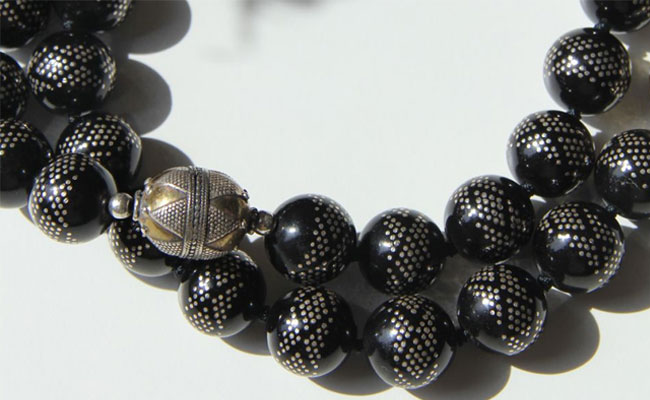 Close up of black coral beads