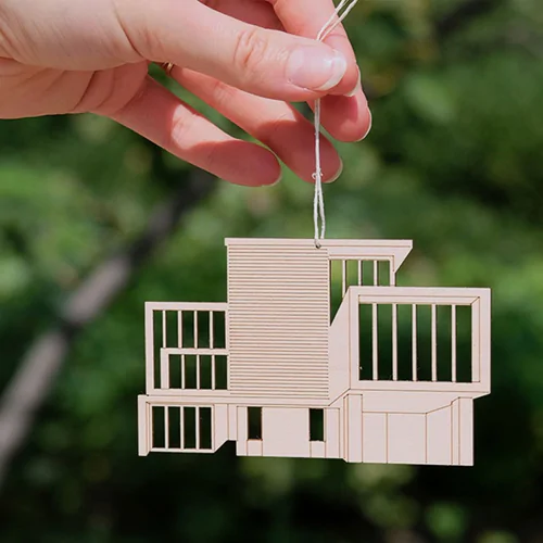 Wood ornament in the shape of the Gardiner Museum