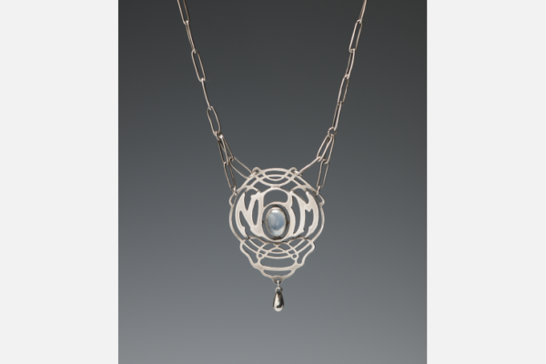 Silver necklace with moonstone and pendant, c.1929. Hand-wrought chain with cut out “NBM” (Nellie Mae Bartlett) monogram. Newcomb Art Collection; gift of Nelle Mae “Jack” Bartlett Kelleher, Tulane University, New Orleans, LA.